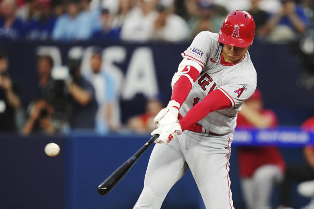 Ohtani homers in 3 straight at-bats over 2 games before being sidelined by  cramps — again