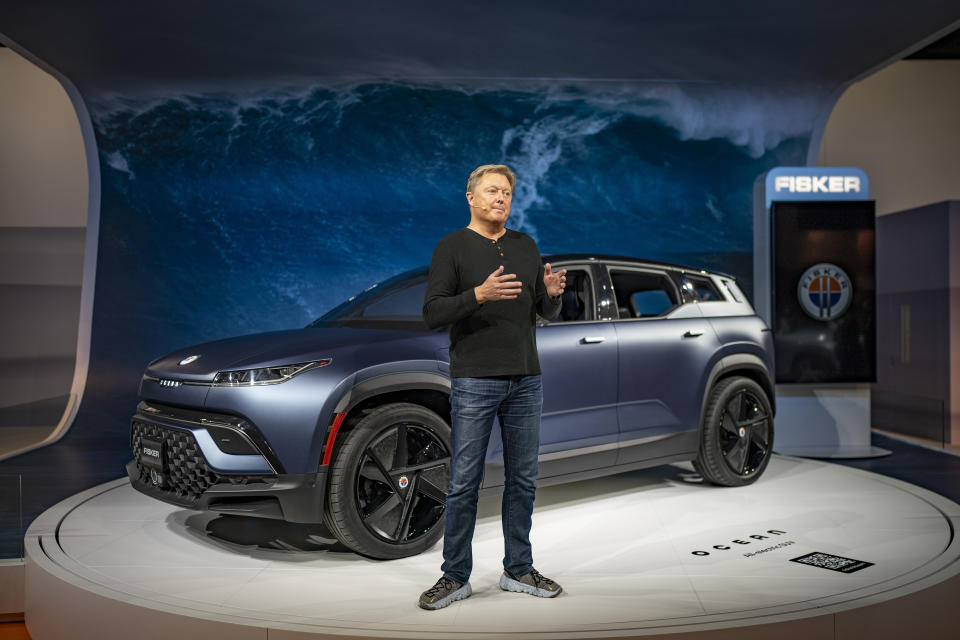 Henrik Fisker, the Fisker CEO, presents the new all-electric 630km range advanced technology Fisker Ocean car during the Mobile World Congress 2022 in Barcelona, Spain, Monday, Feb. 28, 2022. (AP Photo/Joan Mateu Parra)