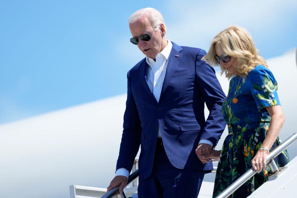 President Joe Biden and first lady Jill Biden disembark Air Force One at Harrisburg International Airport on Sunday (AP)