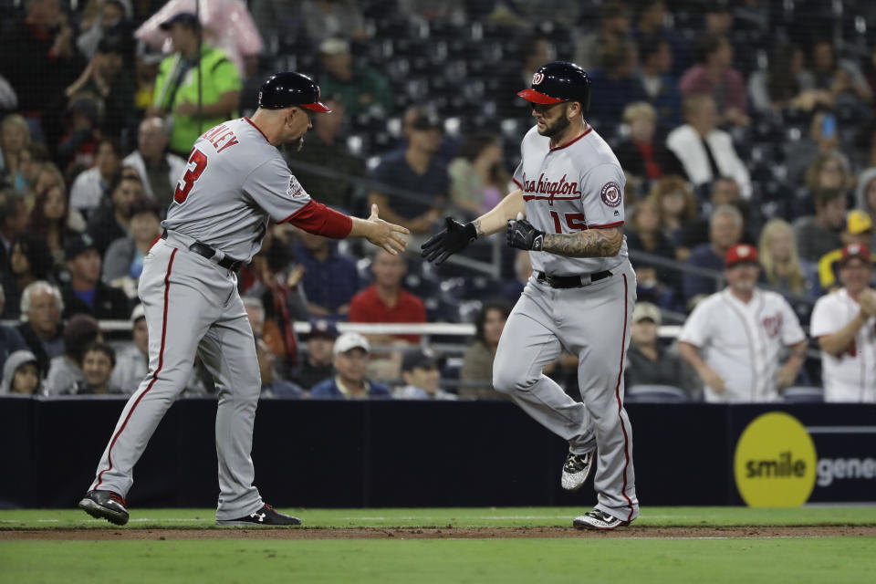 A familiar sight, Matt Adams (right) trotting around the bases (AP Photo/Gregory Bull)