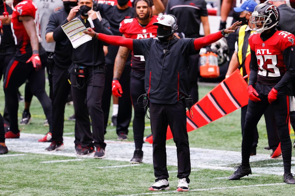 ATLANTA, GEORGIA - OCTOBER 25:  Interim head coach Raheem Morris of the Atlanta Falcons reacts during the second half against the Detroit Lions at Mercedes-Benz Stadium on October 25, 2020 in Atlanta, Georgia. (Photo by Kevin C. Cox/Getty Images)