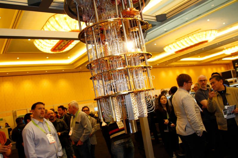 Attendees view a prototype of IBM's 50-qubit quantum computer during the 2018 CES at the Sands Expo center in Las Vegas. The FBI said quantum information science has the potential to drive innovation across the American economy, but foreign adversaries already are trying to use it to gain the advantage. File Photo by James Atoa/UPI