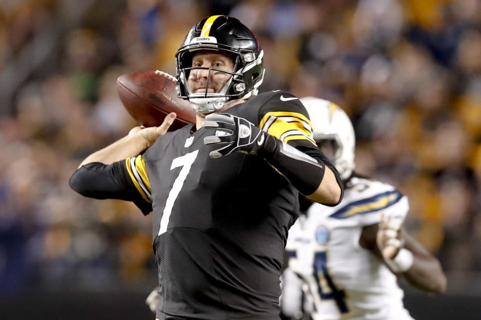 Pittsburgh Steelers quarterback Ben Roethlisberger (7) passes under pressure by Los Angeles Chargers defensive end Melvin Ingram (54) in the first half of an NFL football game, Sunday, Dec. 2, 2018, in Pittsburgh. (AP Photo/Don Wright)