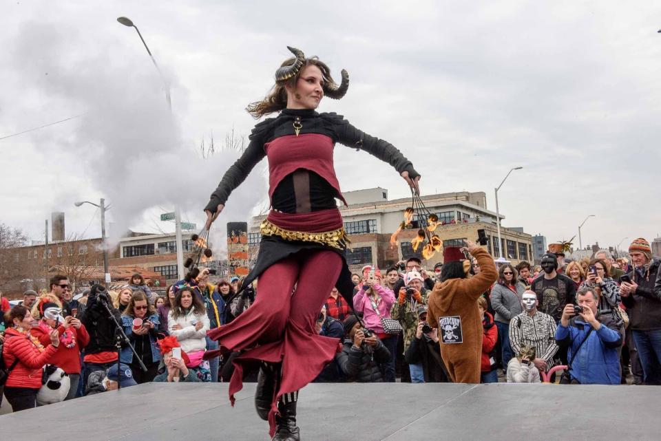 Elyse Wade performs at the Marche du Nain Rouge parade through Detroit's Cass Corridor on March 24, 2019.