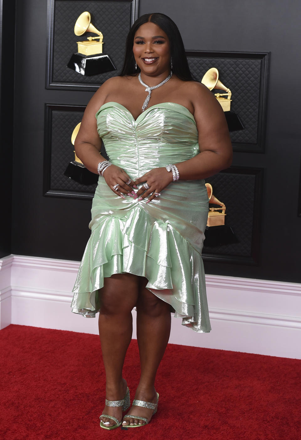 Lizzo arrives at the 63rd annual Grammy Awards at the Los Angeles Convention Center on Sunday, March 14, 2021. (Photo by Jordan Strauss/Invision/AP)