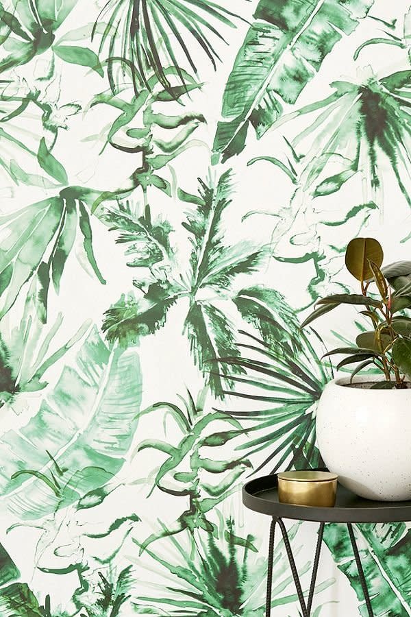 We're constantly switching up our home's aesthetic to suit our changing needs. That's why <a href="https://www.huffingtonpost.com/entry/the-best-places-to-buy-removable-wallpaper_us_5ac3b7fde4b04646b6470800" target="_blank">removable wallpaper</a> is the perfect solution to home upgrades that will make a difference without breaking the bank. Get this <a href="https://www.urbanoutfitters.com/shop/expressive-palms-removable-wallpaper?category=SEARCHRESULTS&amp;color=038" target="_blank">tropical wallpaper</a> at Urban Outfitters.