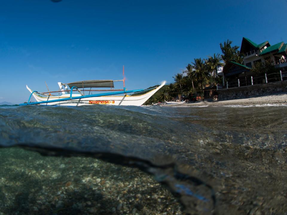 A boat is seen off the coast of Oriental Mindoro in 2016.