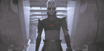 The animated character, the Grand Inquisitor, from the Star Wars franchise, is shown in a dark, sinister costume with armor