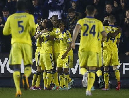 Chelsea's Didier Drogba (4th L) celebrates his goal against Shrewsbury Town with team mates during their League Cup fourth round soccer match at Greenhous Meadow in Shrewsbury, central England October 28, 2014. REUTERS/Darren Staples