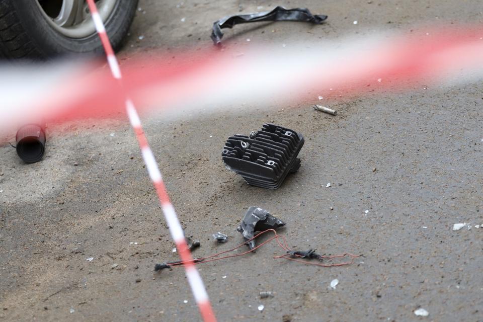 Scattered remains lie on the ground near a damaged apartment's building after a reported drone attack in St. Petersburg, Russia, Saturday, March 2, 2024. Russian authorities said Saturday morning that an "emergency" damaged an apartment building in St. Petersburg. State news agency Tass said that the damage was caused by an "explosion," while local news and social media said that a drone had hit the building. There were no casualties, St. Petersburg Gov. Alexander Beglov wrote on Telegram. (AP Photo)