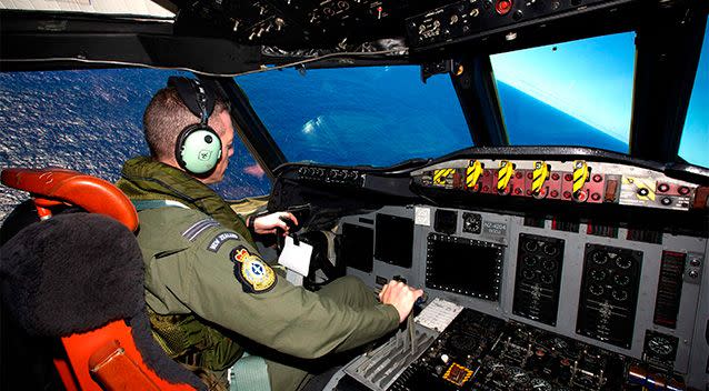 oyal New Zealand Air Force (RNZAF) Captain Flight Lieutenant Timothy McAlevey sits in the cockpit of a RNZAF P3 Orion maritime search aircraft as it flies over the southern Indian Ocean looking for debris from missing Malaysian Airlines flight MH370. Photo: Reuters.