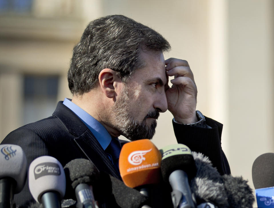 Louay Safi, spokesperson for the Syrian National Coalition, Syria's main political opposition group, gestures as he talks to journalists after a meeting with the Syrian government at the United Nations headquarters in Geneva, Switzerland, Switzerland, Tuesday, Feb 11, 2014. A second round of peace talks between the Syrian government and the opposition bogged down quickly Tuesday in recriminations about who was responsible for escalating violence that has killed hundreds in the past few days and disrupted food aid for trapped civilians. (AP Photo/Anja Niedringhaus)