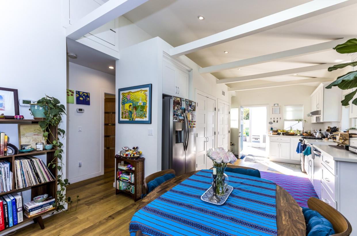 A dining room and kitchen