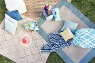 <p>Rugs, pillows and poufs (and picnic blankets, of course!) will create a casual conversation spot that plays into a laid back party vibe.<br></p>