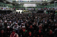 Afghan Shiite Muslim attend a mourning ceremony three days ahead of Ashoura to mark Ashoura, in a mosque in Kabul, Afghanistan, Friday, Aug. 5, 2022. Ashoura falls on the 10th day of Muharram, the first month of the Islamic calendar, when Shiites mark the death of Hussein, the grandson of the Prophet Muhammad, at the Battle of Karbala in present-day Iraq in the 7th century. (AP Photo/Ebrahim Noroozi)