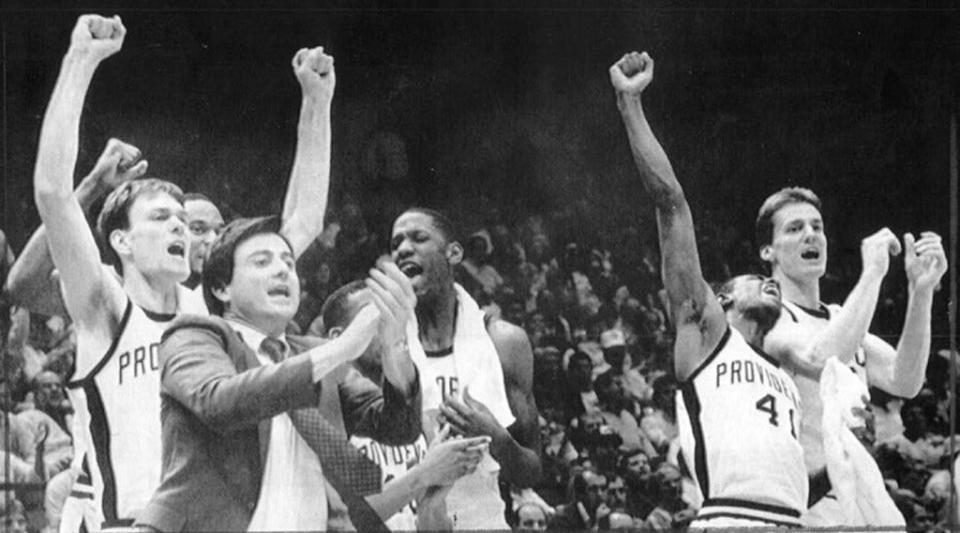 Coach Rick Pitino celebrates a Providence win in the 1987 NCAA Tournament. Their run ended in the Final Four, where the Friars fell to Syracuse, 77-63.