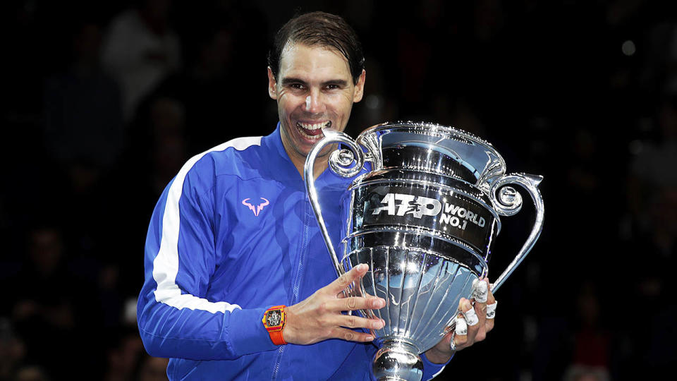 Rafael Nadal celebrating with the year-end World No.1 trophy in London.