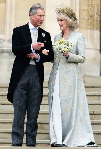 <p>Tim Graham Photo Library/Getty </p> Prince Charles and his wife Camilla leaving the Service of Prayer and Dedication following their marriage at The Guildhall, at Windsor Castle on April 9, 2005.