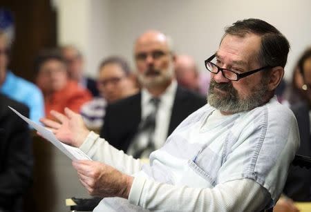 Frazier Glenn Cross, 74, a former senior member of the Ku Klux Klan, talks to the Johnson County District Judge Kelly Ryan (not pictured) during his sentencing hearing in Johnson County District Court in Olathe, Kansas October 10, 2015. REUTERS/Joe Ledford/The Kansas City Star/Pool