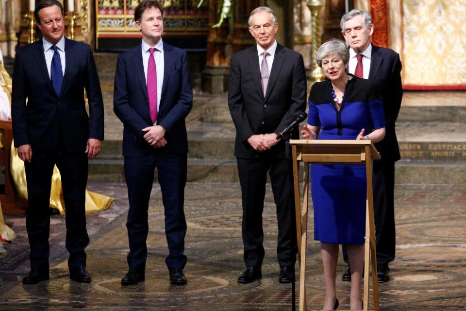 Theresa May speaks at the service for former Cabinet Secretary Lord Heywood (PA)