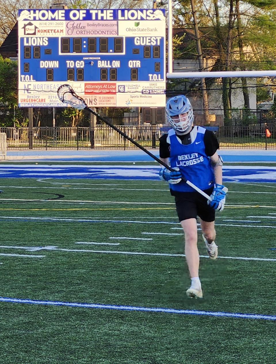 Bexley's Sawyer Bartz jogs during a drill at Monday's practice. The Lions are out to an 8-1 start, exceeding last year's win total by one.