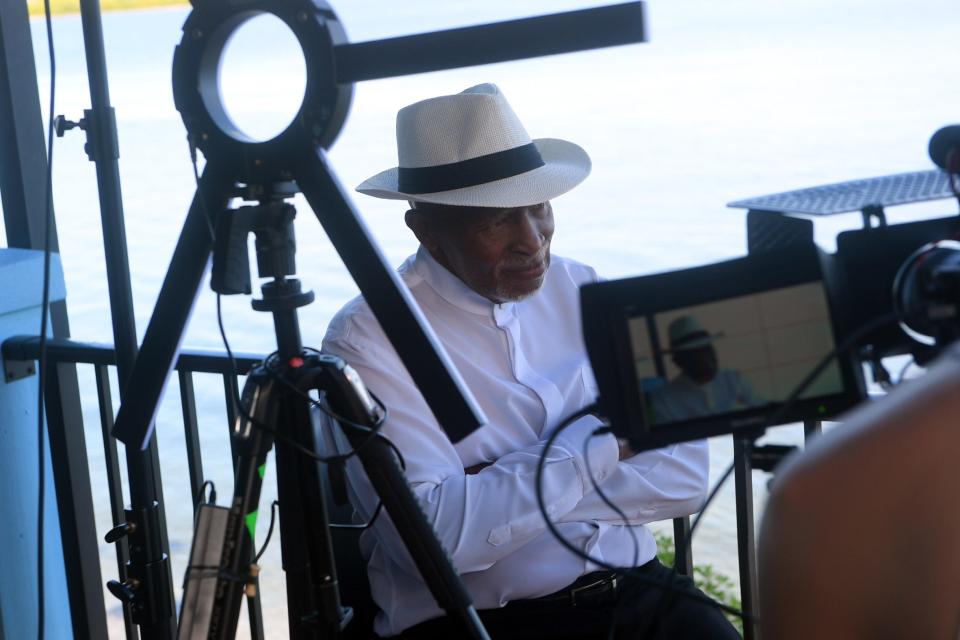 Charles Walker sits down for an interview on Tuesday, Oct. 12, 2021, as part of a documentary being produced about the Highwaymen artists of the Treasure Coast. Walker, one of 26 artists identified as Highwaymen known for their paintings of the Florida landscape, was inducted into the Florida Artists Hall of Fame in 2004. The documentary is being produced by Fort Pierce-native Georgette Angelos and will be played the future Highwaymen museum in Fort Pierce.