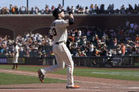 San Francisco Giants' Austin Slater gestures after hitting a two-run home run against the San Diego Padres during the eighth inning of a baseball game in San Francisco, Saturday, May 8, 2021. (AP Photo/Jeff Chiu)