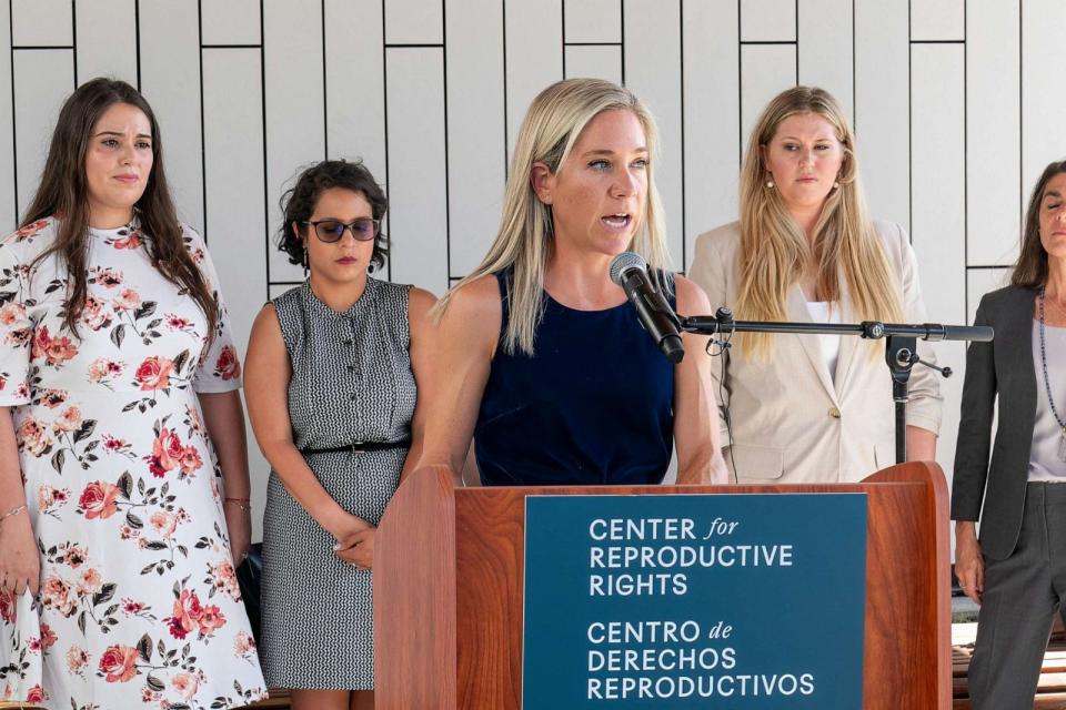 PHOTO: Amanda Zurawski speaks during a press conference outside the Travis County Courthouse on July 19, 2023 in Austin, Texas. (Suzanne Cordeiro/AFP via Getty Images)