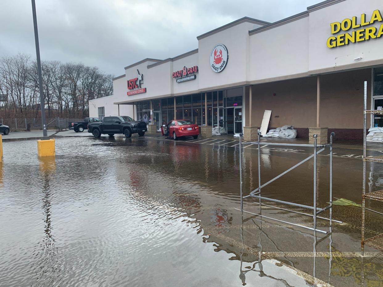 The Branch Avenue Shopping Plaza in Providence, where extreme flooding last year closed multiple businesses.