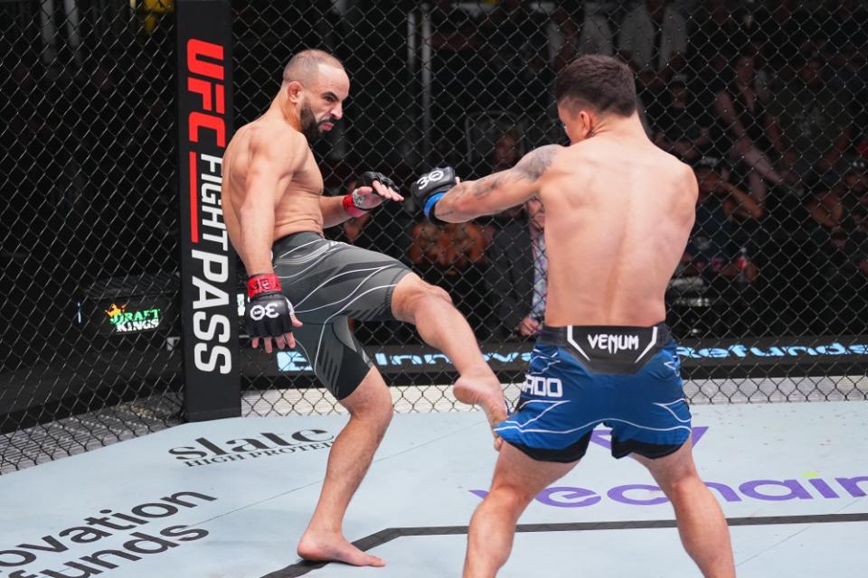 LAS VEGAS, NEVADA – JULY 15: (L-R) Ottman Azaitar of Morocco kicks Francisco Prado of Argentina in their lightweight fight during the UFC Fight Night at UFC APEX on July 15, 2023 in Las Vegas, Nevada. (Photo by Jeff Bottari/Zuffa LLC via Getty Images)