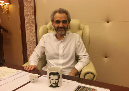 FILE PHOTO: Saudi Arabian billionaire Prince Alwaleed bin Talal sits for an interview with Reuters in the office of the suite where he has been detained at the Ritz-Carlton in Riyadh, Saudi Arabia January 27, 2018. REUTERS/Katie Paul/File Photo