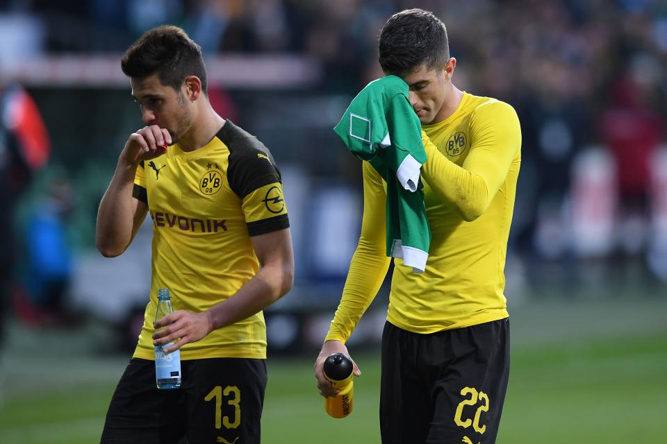 BREMEN, GERMANY - MAY 04: (L-R) Raphael Guerreiro and Christian Pulisic of Borussia Dortmund looks dejected after the Bundesliga match between SV Werder Bremen and Borussia Dortmund at Weserstadion on May 04, 2019 in Bremen, Germany. (Photo by Oliver Hardt/Bongarts/Getty Images)