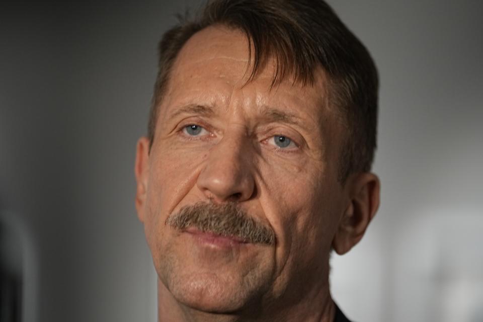 FILE – Russian arms dealer Viktor Bout, who was exchanged for WNBA star Brittney Griner, speaks to the media at an opening for an exhibition of his artwork at the Mosfilm studio in Moscow, Russia, on March 7, 2023. The U.S. successfully negotiated high-profile swaps in 2022 for Griner and Marine veteran Trevor Reed — both designated as wrongfully detained. Moscow Bout, who was serving a 25-year sentence, and pilot Konstantin Yaroshenko, serving 20 years for cocaine trafficking. (AP Photo/Alexander Zemlianichenko, File)