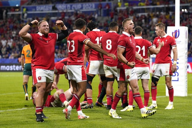 Wales players celebrate beating Australia