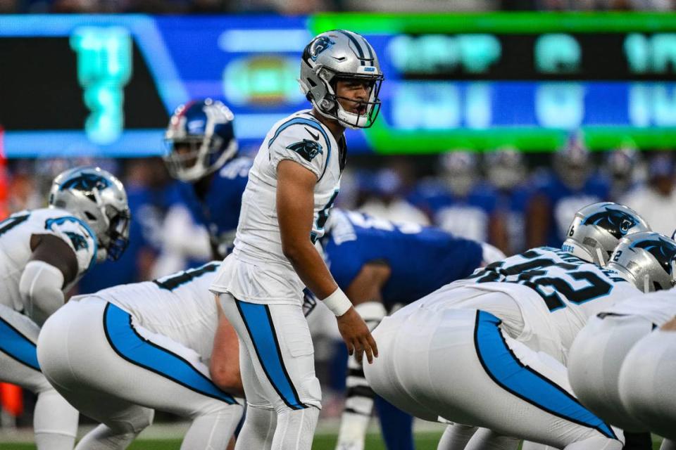 Aug 18, 2023; East Rutherford, New Jersey, USA; Carolina Panthers quarterback Bryce Young (9) takes a snap against the New York Giants during the first quarter at MetLife Stadium. Mandatory Credit: John Jones-USA TODAY Sports