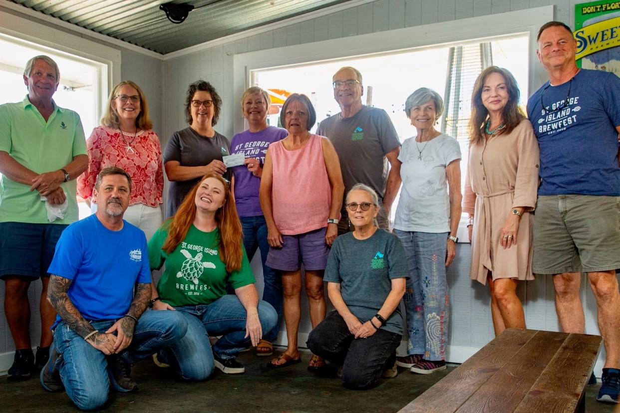 On Wednesday, members of the St. George Island Brewfest Committee presented at check for $70,000 to the Franklin County Humane Society. The Brewfest raised a record amount for their 7th Annual event that took place on April 20 on St. George Island.