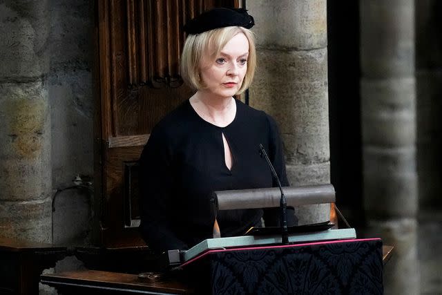 <p>Frank Augstein/WPA Pool/Getty</p> Liz Truss delivers a reading during the state funeral of Queen Elizabeth at Westminster Abbey on Sept. 19, 2022.