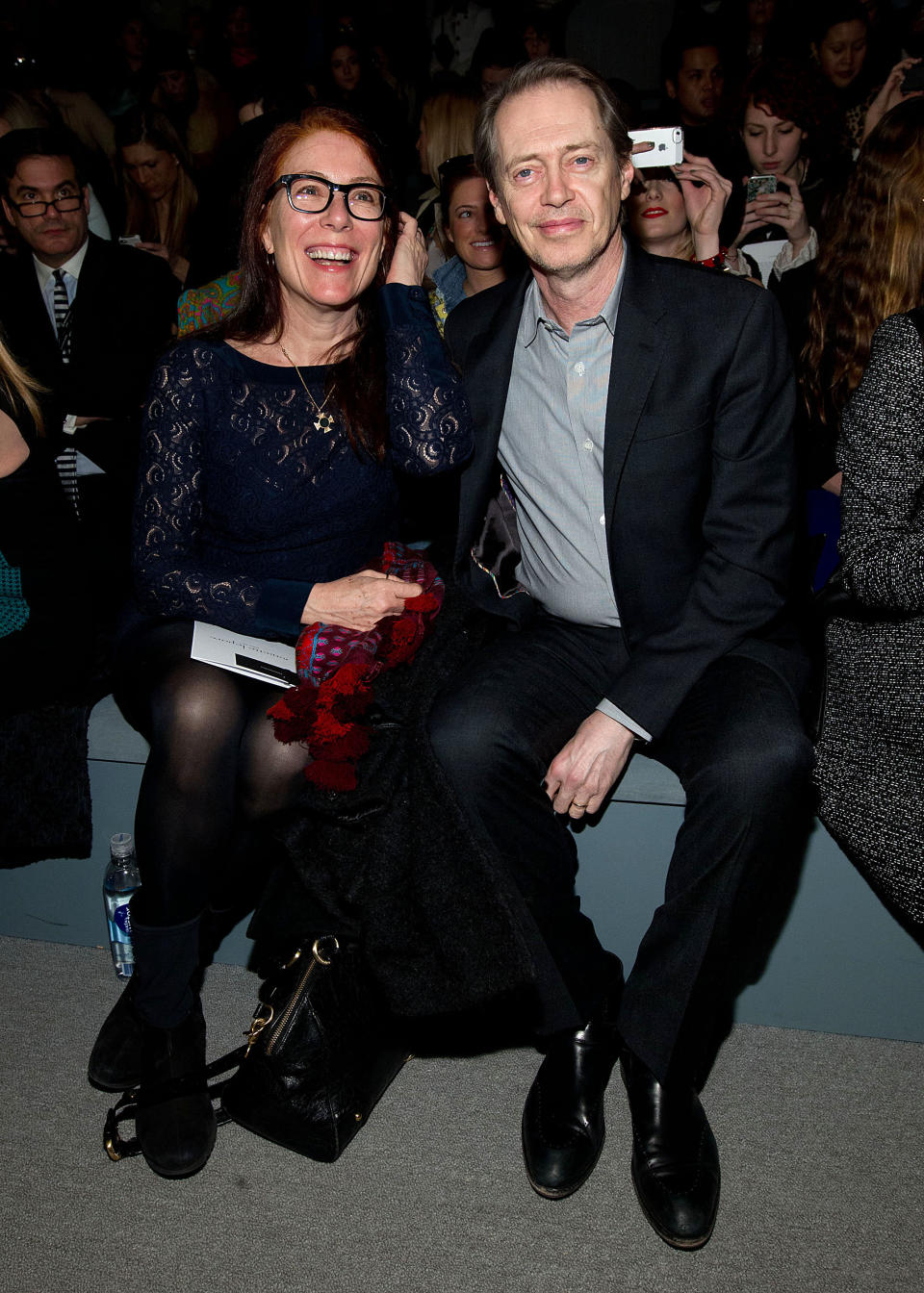 Jo Andres, left, and Steve Buscemi attends the Fall 2013 Nanette Lepore Runway Show, on Wednesday, Feb. 13, 2013 in New York. (Photo by Dario Cantatore/Invision/AP)