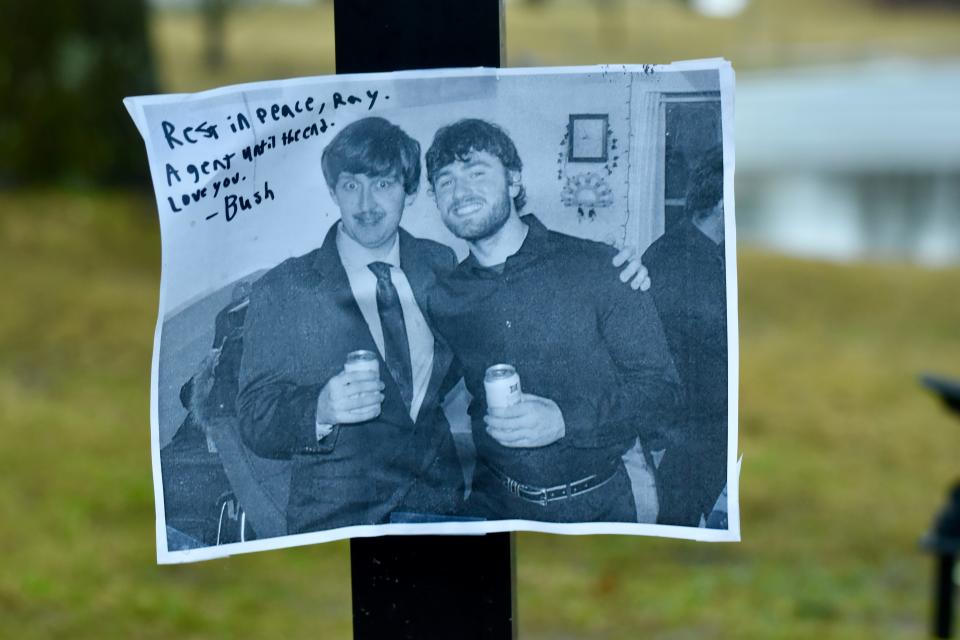 A printed photo of Ray Rattray, left, and his rugby teammate Josh Holland-Weiss, nicknamed Bush.