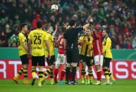 Soccer Football - Bayern Munich v Borussia Dortmund - DFB Pokal Semi Final - Allianz Arena, Munich, Germany - 26/4/17 Borussia Dortmund's Marcel Schmelzer and Bayern Munich's Thiago Alcantara remonstrate with Referee Manuel Grafe Reuters / Michael Dalder Livepic