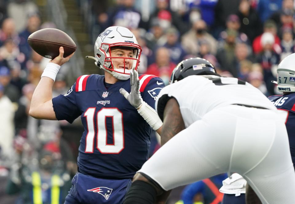 Jan 2, 2022; Foxborough, Massachusetts, USA; New England Patriots quarterback Mac Jones (10) throws a pass against the Jacksonville Jaguars in the first quarter at Gillette Stadium. Mandatory Credit: David Butler II-USA TODAY Sports