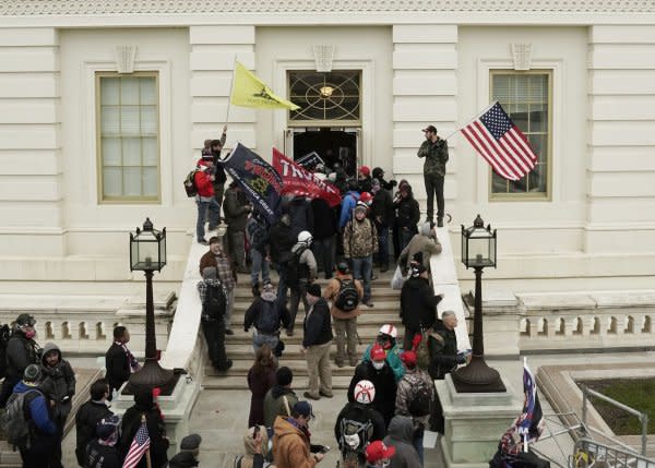 Trump supporters breach the U.S. Capitol to protest the Electoral College vote count to certify President-elect Joe Biden as the winner on January 6, 2021. File Photo by Ken Cedeno/UPI