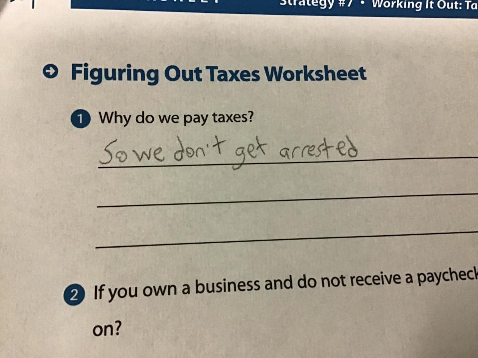 Figuring Out Taxes Worksheet with handwritten answer to "Why do we pay taxes?" stating "So we don't get arrested."