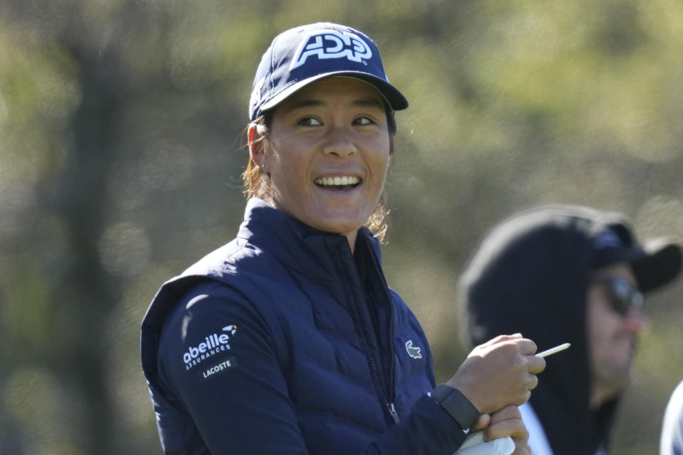 Celine Boutier of France looks at the second hole fairway before her tee shot during the third round of the BMW Ladies Championship at the Seowon Hills Country Club in Paju, South Korea, Saturday, Oct. 21, 2023. (AP Photo/Lee Jin-man)