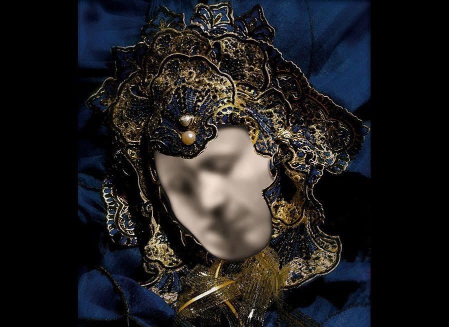 A face in a Venetian mask, or a tender embrace?