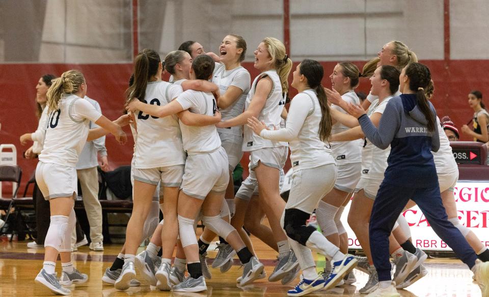 Mansquan celebrate their semifinal win over Red Bank Catholic to advance to SCT Finals. Red Bank Catholic vs Manasquan in SCT Girls Basketball Semifinal on February 15, 2024 in Red Bank. NJ.