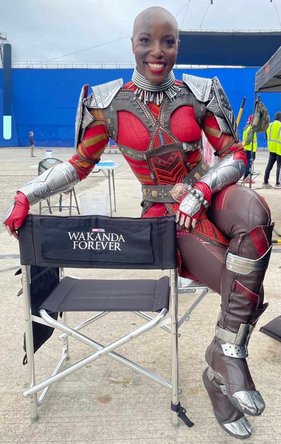 Cathedral City resident Janeshia Adams-Ginyard, who plays Nomble in "Black Panther: Wakanda Forever," take a picture on set.