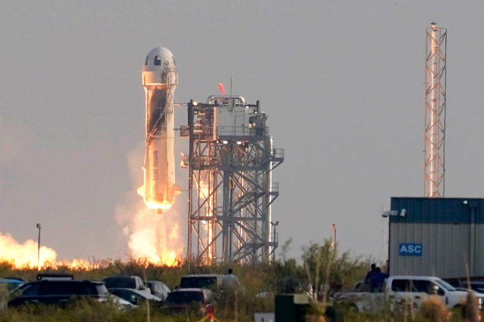 Blue Origin's New Shepard rocket launches carrying passengers Jeff Bezos, founder of Amazon and space tourism company Blue Origin, his brother Mark Bezos, Oliver Daemen and Wally Funk, from its spaceport near Van Horn, Texas (AP)