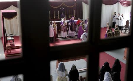 French Bishop Jean-Michel Faure (C) attends a mass in Nova Friburgo near Rio de Janeiro March 28, 2015. REUTERS/Stephen Eisenhammer