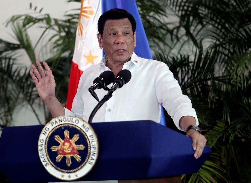 FILE PHOTO: President Rodrigo Duterte speaks after his arrival in Davao